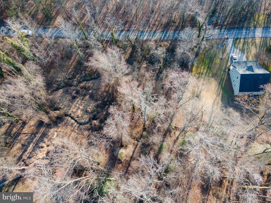 Located in a well-established waterfront community in desirable Anne Arundel County, Maryland, this vacant lot (Tax ID: 020196003386600) presents an excellent opportunity to build your dream home in a peaceful and scenic setting. Surrounded by established residences and the charm of a mature neighborhood, the property offers the potential to enjoy the lifestyle that waterfront communities are known for—relaxing surroundings, nearby water access, and a welcoming community atmosphere. The lot is served by a private well and public sewer, offering added convenience for future development. Conveniently located near shopping, dining, marinas, and major commuter routes, this property is ideal for a primary residence, weekend retreat, or investment in a highly desirable Anne Arundel County location.