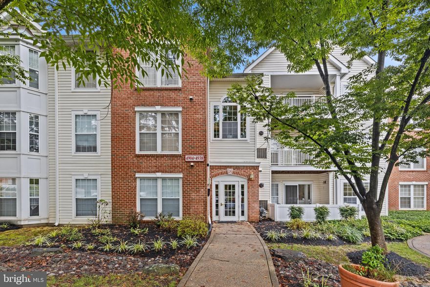 Maryland's local brokerage proudly presents 4918 Stone Shop Circle, Owings Mills, MD 21117. Welcome home to your beautifully maintained main level condo with secured entrance, private front patio, lots of storage, and recent upgrades. Not only does every room boast tons of natural light, you have in-unit laundry and a huge en-suite bathroom. Snuggle up in front of your fireplace or hang out outdoors, this home is great for entertaining with an open concept floor plan and lots of space for guests. Close to commuter routes and steps from a shopping center that offers restaurants, shopping, and entertainment!