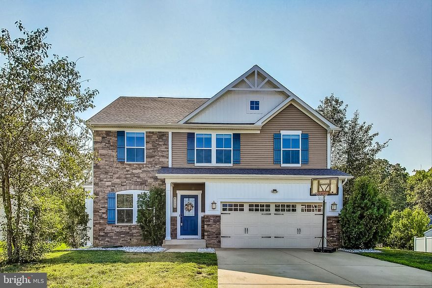 Welcome home to this stunner in the sought after Sunridge neighborhood! Built in 2013, this large home on a private lot offers an abundance of space and high-end finishes. On the main level you will find a den which can be used as an office or extra living area, formal dining room, open concept living room and gourmet kitchen, a sun/morning room and a half bath. Upstairs you will find a generously sized primary suite with two walk-in closets and a bathroom with dual vanities, a soaking tub, and a shower. Three additional large bedrooms, a full bath, and the laundry room finish up the upstairs. The spacious unfinished basement, complete with rough-in for a third full bath provides a blank canvas to create an entertainer's dream or a space for in-laws, an au pair, or guests!. A garage large enough for two cars plus storage completes the home. Close to shopping and restaurants, this home is a commuter’s dream offering easy access to major commuter routes into Washington, D. C. and northern Virginia. Hurry to end the year in a new home!