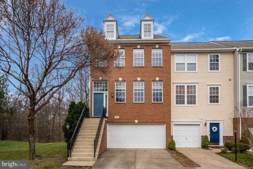 Introducing an exquisite townhouse nestled in the coveted neighborhood of Broadlands, offering the perfect blend of luxury and comfort. This immaculate residence boasts a new roof installed in 2024, freshly painted interiors, and upgraded light fixtures, ensuring a modern and inviting ambiance throughout. Elegant hardwood flooring graces the main level, leading to an inviting gourmet kitchen featuring a spacious center island, stainless steel appliances, and ample cabinet storage.

Upstairs, the primary suite provides a serene retreat, complemented by two additional bedrooms sharing a well-appointed hall bath. Enjoy the tranquility of the surrounding lush trees from the deck accessible directly from the kitchen, creating an ideal space for alfresco dining or relaxation. The expansive side yard offers added privacy, perfect for outdoor gatherings or leisurely strolls.

Descend to the lower level where a cozy fireplace beckons, creating a warm and inviting atmosphere in the spacious living area. This level also features a convenient half bath and offers seamless access to a charming brick patio, perfect for enjoying the serene outdoor surroundings.

With its desirable features, including a new roof, new HVAC 2020, hardwood floors, gourmet kitchen, and outdoor living spaces overlooking the woods, this townhouse presents a rare opportunity for discerning buyers seeking the epitome of modern comfort and style in an idyllic Broadlands location. Don't miss the chance to make this exquisite property your new home.