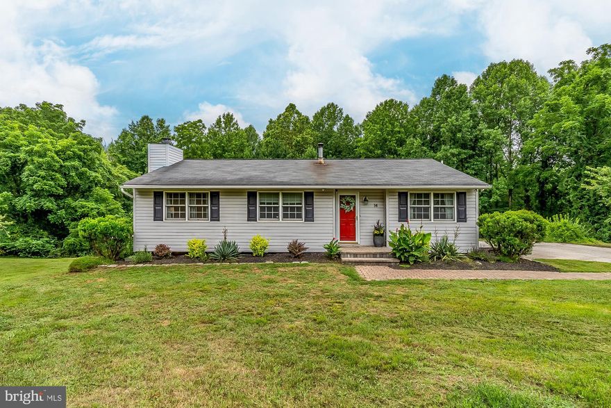 Come see this meticulously maintained home, nestled on 2.08 acres.  Situated at the end of a peaceful cul-de-sac in a lovely Suburban neighborhood.    Looks may be deceiving but this home is very large inside, total of almost 2600 sq. ft.   4 bedrooms, 3 full baths, finished lower level with wood stove, walk-out and laundry area . Some of the featured updates include renovated bathroom (2021), water pressure tank (2022), garbage disposal (2019), washer/dryer (2017), dishwasher (2018), hot water heater (2017) and the oven was replaced in 2016. The outside boasts a wonderful deck off the dining room overlooking woods/trees and outside speakers.  In 2018 a 20 x 14 Pine creek structure was purchased.  This unit has a peaked roof, reinforced floor to support a vehicle, lawn mowers or motorcycles.  It is also fully wired with electric inside and out, light switches and plenty of outlets.  Could be a perfect workshop.  All of this and conveniently located to shopping, restaurants and transportation.  Don't miss this one!!!