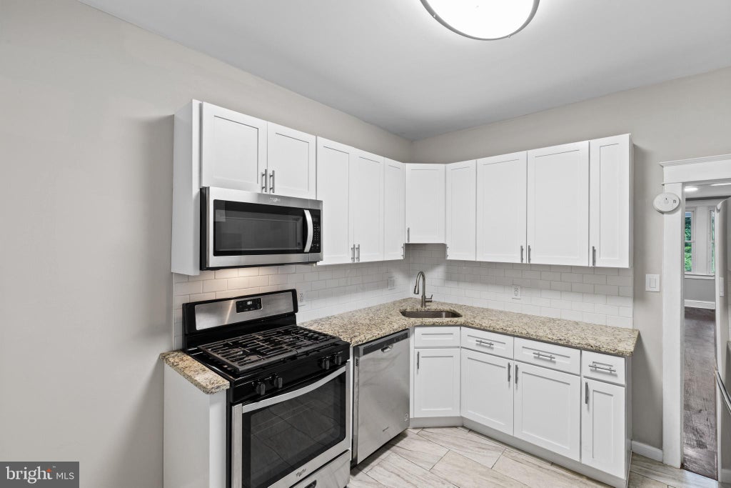 Photo of 222 N Hilton Street, BALTIMORE, MD 21229 (MLS # MDBA2232298)