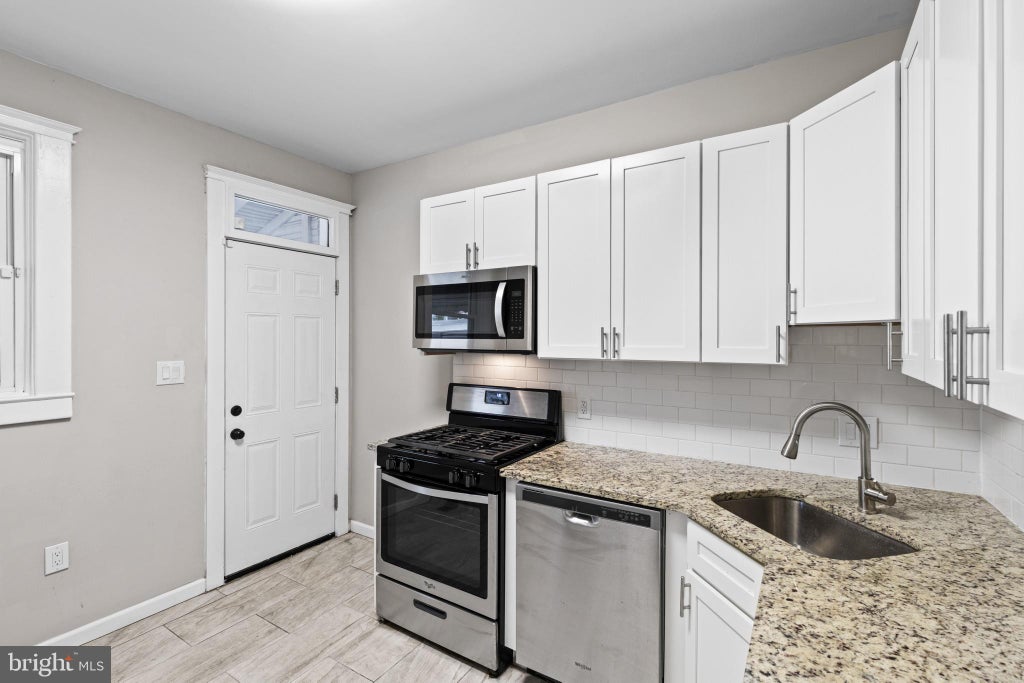 Photo of 222 N Hilton Street, BALTIMORE, MD 21229 (MLS # MDBA2232298)