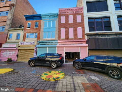 Photo of 559 Old Town Mall, BALTIMORE, MD 21202 (MLS # MDBA2233740)