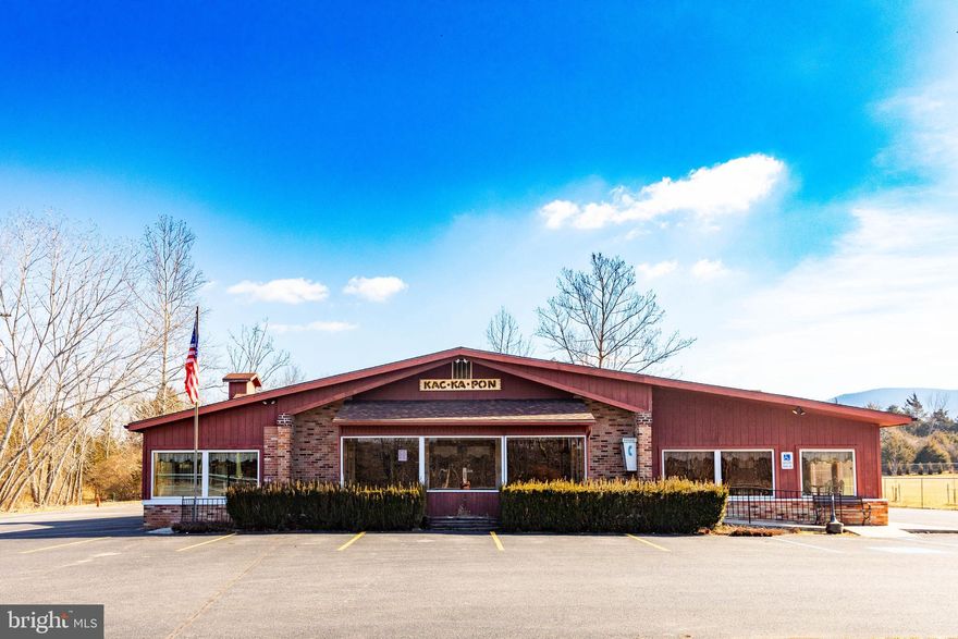 This widely known restaurant has been in operation for over 60 years.  The traffic count for this area is some of the most traveled in Hardy County and in the direct route from northern VA/MD to many of WVs top recreation spots. The restaurant dining and commercial kitchen space makeup over 4,192 sq. ft.  The basement level has over 2,000 sq. feet for storage and utility room.  The interior layout is largely open dining space with  three restrooms , large kitchen, one walk-in freezer and one walk-in cooler and an office.  The interior finish is painted drywall with commercial vinyl and carpet flooring.  The building is served by electric forced warm air heat and central air conditioning as well as public water and sewer.  
The majority of the parking lot is paved with asphalt paving including 40 designated parking spots with seating for over 120 persons.