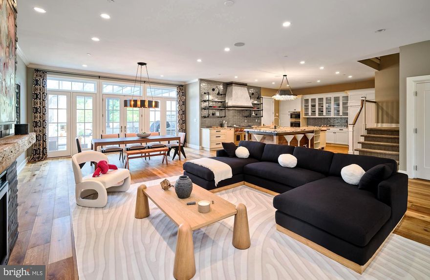 Catch a glimpse of bold & alluring sophistication inside Rabbit Run’s very own Residence Four. Located within New Hope’s most prestigious gated community, built with the utmost craftsmanship by Barley Custom Homes, this dashing unit exhibits over $600k in premier upgrades with very unique characteristics such as exposed barnwood-beams, distinctive light fixtures, metallic subway tile, custom millwork, designer wallpaper, and countless built-ins. Rarely does one encounter such an eclectic variety of design artistry. With soaring ceiling heights and a hip ambiance, the foyer warmly welcomes you into the home’s grand & dynamic atmosphere. Indulge in the exquisite office space, maximized by its impressive, floor-to-ceiling custom cabinetry and matte black twin light fixtures. The living room is creative & versatile, making it an ideal space for lounging and unwinding. The gourmet chef’s kitchen is “industrial-chic” in style, with an oversized granite island, custom Wolf appliances (including a 6-burner range with double oven), a customized Subzero refrigerator, and statement lighting. A sexy black stone fireplace adorns the open-concept living area, creating an intimate & alluring entertaining experience. Take the private elevator to your second level primary suite, which includes a cool, illuminated showcase wall and a refreshingly white hardwood tray ceiling. The walk-in closet is exceptional, embellished with custom shelving and center island storage. Decompress & renew in the opulent spa-inspired bathroom, inclusive of a double-sized glass shower, a private soaking tub, mood lighting, triple granite vanities and a private lavatory. The second floor includes 2 additional guest suites with full baths, walk-in closets, and tasteful selections & finishes. Dimly lit sconces set the mood in your fully-finished lower level fit for the Oscars, featuring a “theater” area with an overhead projector, built-in surround-sound, full bathroom and a ritzy wet bar with beverage refrigerators. Unwind outside on your comfortable patio, amongst a welcoming wood-burning fireplace and built-in Wolf barbecue grill. This spacious blue-stone sanctuary is perfectly exclusive & accommodating, ideal for morning coffee or al fresco dining. Officially surpassing turn-key, this townhome provides unequivocal luxury to a polished buyer. Ideally situated within walking distance of small town boutiques, trendy cafes, fine dining, art galleries, walking/cycling paths, an award-winning school district and major commuter routes, RR4 provides a fashionable arrival to a community of charming culture. Low-maintenance. High luxury. Tremendous value. This exquisite townhouse represents the epitome of affluent living, and it is yours for the taking.