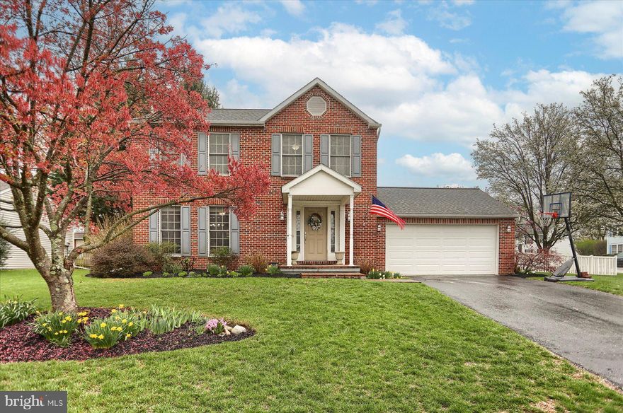 Nestled in a serene neighborhood near Carlisle Pike and the Borough of Mechanicsburg in the Cumberland Valley School District, this charming brick-front two-story home is a true gem. The property features a spacious, fenced rear yard with stunning landscaping, perfect for outdoor activities and relaxation. On the main level, you'll find a generous living room with large windows and a cozy corner wood-burning fireplace, ideal for creating a warm and inviting atmosphere. The dining room is adorned with elegant crown molding and chair rail, leading to a modern kitchen equipped with high-end stainless steel appliances (induction range) and a dining area that opens to a sunroom. The sunroom, with its cathedral ceiling, offers a beautiful view of the rear yard, making it a perfect spot for morning coffee or evening unwinding. A wide staircase leads to the second level, where you'll discover a primary bedroom with a beautifully updated bath and walk-in closet, providing a private retreat. Two additional bedrooms and a hall bath offer ample space for family or guests. The finished lower level is perfect for entertaining or family enjoyment, featuring a spacious family room, office space or multipurpose room, and a laundry/utility room. Don't miss the additional cabinetry for storage or pantry space as you head downstairs. Conveniently located close to dining, shopping, and major transportation, this home offers both comfort and accessibility. Plus, its proximity to schools and community parks adds to its appeal, making it an ideal location.