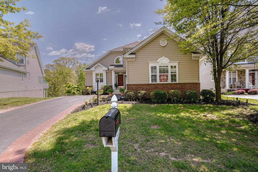 In one of Maryland's most desired neighborhoods, this beautiful home is located in prestigious Bulle Rock, This amazing home has hardwood flooring, two-story foyer, wood/carpet staircase, wood shutters, formal living and dining rooms, moldings, columns, and much more! A spacious loft overlooks the living room, high above. The huge, eat-in kitchen has tile floors for easy cleaning, a large pantry and plenty of wonderful, brand new appliances to aid any cook. The primary bedroom on the main floor has vaulted ceilings and a jet tub in the adjoining bathroom. The upper level has two generous sized bedrooms and of course that loft area, perfect for study or relaxing. The lower level, although unfinished, has plenty of room to grow including a rough-in for an additional bathroom. You will have to come and see this home for yourself!! Bulle Rock offers an endless list of amenities to include landscaping, lawn care, snow removal, a guard shack and much more. The Residents' Club features a gym, sauna, billiard room, meeting rooms, library, indoor and outdoor pools, a tennis court and much more. Better hurry!