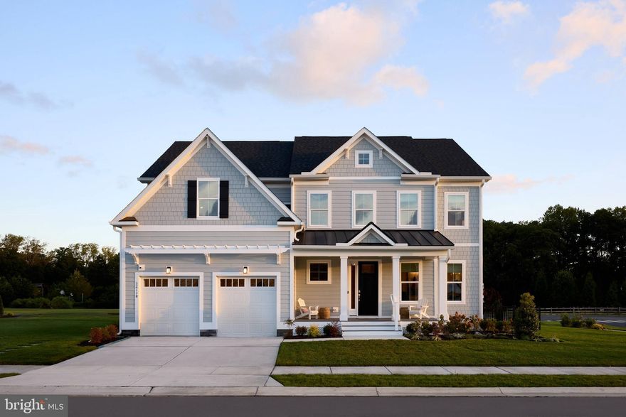 Welcome to the Newport Model Home by Foxlane Homes, located in the boutique community of Suncrest in Lewes, Delaware. This stunning, fully completed showcase home offers 4,859 square feet of beautifully finished living space, featuring 5 bedrooms, 4.5 bathrooms, and a spacious 2-car garage, thoughtfully designed to highlight the best of Foxlane’s craftsmanship and luxury upgrades.

Step inside and you're immediately greeted by a dramatic two-story foyer that flows seamlessly into a spectacular great room with soaring cathedral ceilings and abundant natural light. The open-concept layout creates an inviting atmosphere throughout the main living areas, perfect for both everyday living and entertaining.

The gourmet kitchen is truly the heart of the home, showcasing elegant two-toned cabinetry, soft white quartz countertops, premium appliances, and an oversized island ideal for gathering with family and friends. A custom coffee bar adds both convenience and a touch of everyday luxury.

The first-floor owner’s suite provides a private retreat, complete with a cathedral ceiling, box bay window, and a spa-inspired bath designed for comfort and relaxation.

Upstairs, the home continues to impress with three additional bedrooms, two full bathrooms, and a fully finished bonus room, offering flexible space for a media room, home office, or guest retreat.

The fully finished basement expands the home even further, providing endless possibilities for entertaining, recreation, fitness, or multigenerational living.

Step outside to enjoy the beautiful outdoor living space, perfect for relaxing or hosting gatherings while taking in the peaceful surroundings.

Suncrest is a boutique community of just 36 homesites, offering a quieter coastal lifestyle with amenities including pickleball courts, a bocce court, and a cozy firepit gathering area—all just minutes from Lewes beaches, dining, shopping, and historic downtown.

Loaded with designer upgrades and thoughtful details throughout, this Foxlane model home truly must be seen in person to appreciate the craftsmanship, space, and exceptional value it offers.