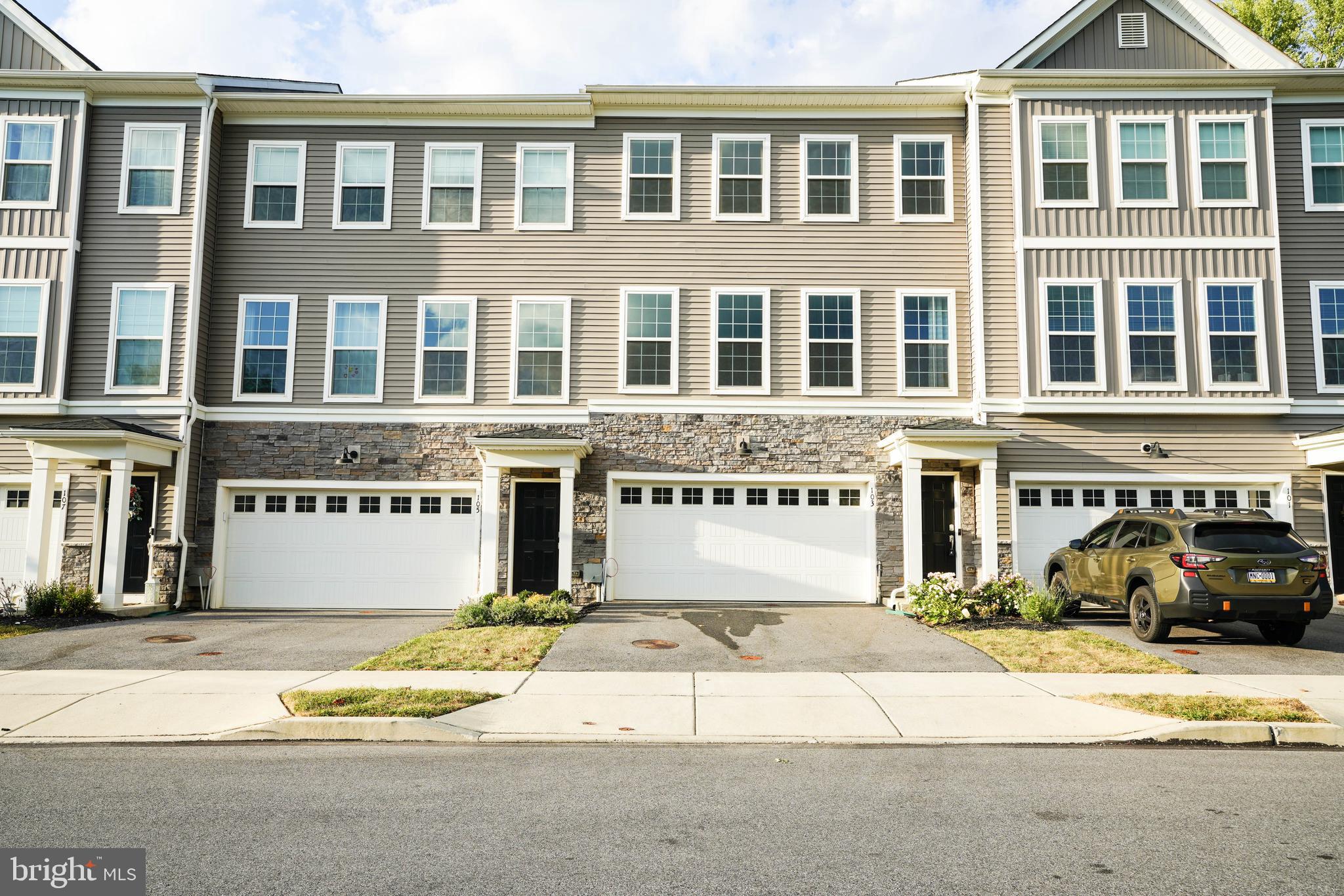 Welcome to this beautifully designed 3-story townhome offering the perfect blend of comfort, convenience, and style. Nestled in a highly sought-after neighborhood, this residence is just minutes from shopping, dining, and major commuter routes—making everyday living a breeze.
Step into a spacious 2-car garage with EV charger and direct access to a finished basement—ideal for a home gym, office, or entertainment space. A rear door opens to your community lawn, perfect for relaxing or hosting outdoor gatherings.
The heart of the home features an open-concept layout with a generous living room, dining area, and modern kitchen—perfect for entertaining or cozy nights in. Enjoy the convenience of a half bath and step out onto a charming deck for morning coffee or evening sunsets.
Upstairs, you’ll find three comfortable bedrooms and two full baths, including a serene master suite with a walk-in closet and private bath. A dedicated laundry room on this level adds everyday convenience—no more hauling baskets up and down stairs.
Whether you're a growing family, a professional seeking space and style, or simply looking for a low-maintenance lifestyle in a vibrant area, this townhome checks all the boxes.