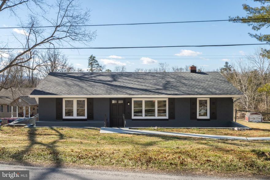 Renovated ranch-style home in a peaceful country setting, ready for its new owners! This charming 3-bedroom, 2-bath home has been beautifully restored, featuring updated kitchens and bathrooms. An additional lot expands the property to a total of 1.65 acres, offering plenty of space to enjoy. Picture yourself relaxing on the front porch with your morning coffee or tea. With no HOA and no restrictions, this home provides both comfort and freedom. A true gem inside and out!