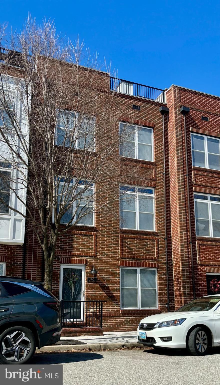 Welcome to this beautiful 3 bedroom, 2 full bath, 2 half bath townhouse nestled in the desirable community of McHenry Pointe in Locust Point. This home is in pristine, move-in ready condition and boasts hardwood floors throughout. The entry level features an office/den (which could be converted into a fourth bedroom by adding doors), a half bath, a laundry room equipped with a washer and dryer, a new water heater (2024), and a spacious 2 car garage with ample storage shelving.
On the first floor, you'll find a dining room opening to a living room with lovely views of the community green space. The eat-in kitchen is outfitted with stainless steel appliances, granite countertops, and a gorgeous tile backsplash. The bedroom level offers a large primary suite with a walk-in 
closet and en suite bathroom, featuring a walk-in shower, soaking tub, and dual vanity. This floor also includes a hallway full bathroom, linen closet, and two additional bedrooms. The upper level is perfect for entertaining with a wet bar area and rooftop patio, providing fabulous city views and a new roof (2024).
This meticulously maintained home is minutes away from the Inner Harbor, Latrobe Park, local restaurants and entertainment, and offers easy access to I-95.
Come see this beautiful home and make it yours today!