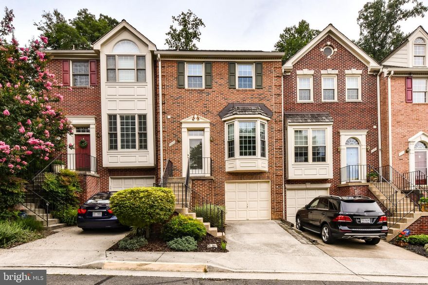 Beautiful 3-bedroom, 2 full and 2 half-bath townhome located on the Falls Church/Arlington border! This home features elegant columns, arches, crown moldings, and gleaming hardwood floors. The bright kitchen is equipped with granite countertops, stainless steel appliances, and tiled flooring. 

Open the French doors to the master bedroom to find a luxurious soaking tub in the master bathroom. The basement includes a spacious recreation area with a brick fireplace, a full bath, and a washer/dryer. 

Enjoy your morning coffee on the private deck in the backyard, and take advantage of the lower patio for grilling. This townhome is just minutes away from dining, shopping, and Washington, DC. It won't last long—make your showing appointment today!