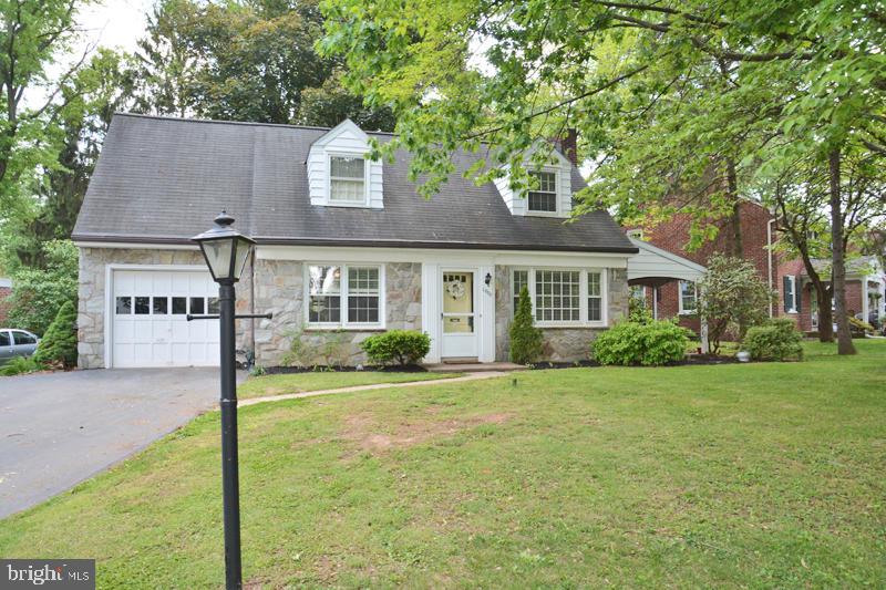Grand home in Grandview! This beautiful stone cape is well situated on a large lot with lots of shade and mature landscaping! Inside you will find lovely hardwood floors, nicely decorated large rooms including Formal Dining & Living Room and a large eat-in Kitchen. The Living Room is huge with the central feature of a wood burning FP with stone mantle. This room also accesses the covered side patio for Summer relaxation! Upstairs are 3 nice sized bedrooms, two with dormer nooks and all with hardwood floors. The total renovation of the main bath highlights this area with all new fixtures, tub & shower as well as tile and flooring too! The lower level is partially finished and houses the laundry area as well as room for a LL Family Room or Rec area + lots of room for storage. Outside, this..
