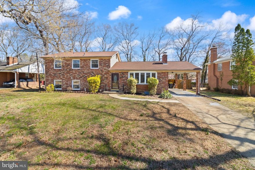 Welcome to 6812 Westchester Ct in Temple Hills—a spacious and well-appointed home offering four fully finished levels of versatile living space. Featuring hardwood floors and LVP throughout, this home combines durability with style for easy everyday living.
The updated kitchen is equipped with granite countertops and ample workspace, seamlessly connecting to the main living areas—perfect for both entertaining and daily routines. A cozy fireplace adds warmth and character, creating an inviting space to relax.

With five generously sized bedrooms and three full bathrooms, including a private primary suite, there’s room for everyone to spread out comfortably. The multiple finished levels provide flexibility for home offices, guest space, recreation, or multigenerational living.

Outside, enjoy a spacious, flat fenced yard—ideal for outdoor gatherings, play, or pets—along with the convenience of a carport for covered parking.

Located just minutes from Andrews Air Force Base, this home offers both comfort and convenience in a well-connected location.