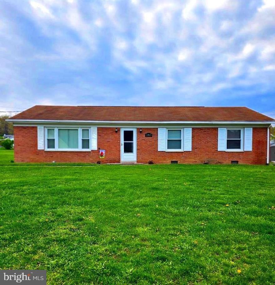 For those wondering why did the owners buy and now want to sell so quickly.  The reason is for 4+ years they have been waiting for a home beside the seller's dad.  Guess what! The house became available the day before closing.  At first they thought they would still move in Pershing but after thinking over the pros and cons they decided the convenience of being so close to him outweighed keeping the house they searched so hard for over the past year.  The home is a charming ranch-style home, a delightful blend of comfort and functionality! Nestled on a spacious 0.21-acre lot, this inviting property features a beautifully cleared and level yard, perfect for outdoor gatherings or serene moments in your front or rear yard.  The back patio and yard are ideal for entertaining or simply unwinding while taking in the stunning mountain views. The side yard offers enough space to build a garage of your dreams (which we had planned.)  The exterior boasts durable brick construction, complemented by a shed for all your storage needs. With a paved driveway offering ample parking for up to four vehicles, accessibility is a breeze.  Inside, you'll find three cozy bedrooms and a well-appointed full bathroom, with laundry hook-ups conveniently located on the main floor. This home is ready for your personal touch, offering a warm and inviting atmosphere that welcomes you from the moment you arrive. Don’t miss the opportunity to make this lovely property your own!