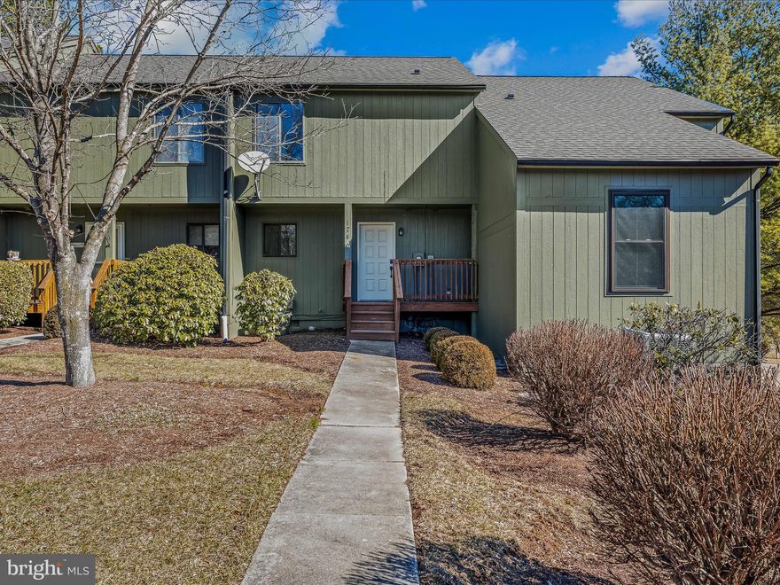Welcome to this beautifully maintained, maintenance-free townhome located on the golf course at Woods Resort in Hedgesville, WV. Offering an easy, relaxed lifestyle with no worries about upkeep, this home is perfect for those seeking convenience and luxury in a serene, natural setting. The home features 2 bedrooms and 2.5 bathrooms. With no exterior maintenance required, you can focus on enjoying the exceptional amenities of Woods Resort, including the golf course, hiking trails, and clubhouse. Whether you’re looking for a full-time residence or a weekend getaway, this townhome offers the ultimate in low-maintenance, luxury living with a front-row seat to the beauty of the golf course.