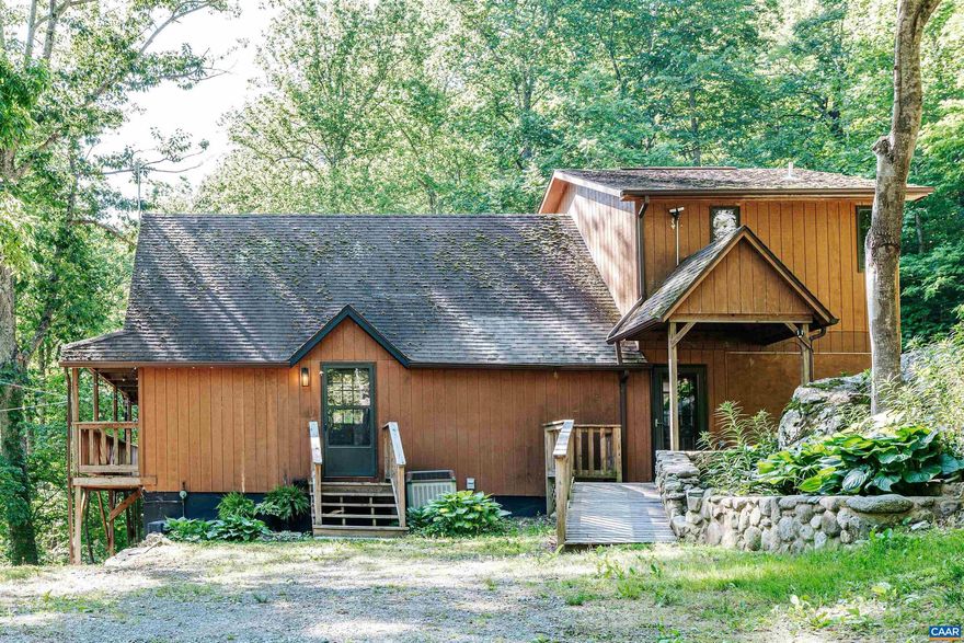 Discover your mountain retreat at "Haven Hollow," a serene escape that is conveniently located at the base of Shenandoah National Park, 15-min from Stanardsville, 25-min from Ruckersville and Skyline Drive, 35-min from  Charlottesville, and just under 2 hours from DC! This charming 2-bedroom, 2-bathroom cabin, with an additional bonus room for a 3rd bedroom, offers 1,792 fin sq ft of beautifully renovated living space. The home features a generator and stunning updates throughout, including a forest green kitchen with a center island, stainless steel appliances, and generous pantry space. The primary suite boasts an optional separate entrance, privacy, abundant natural light, a spacious shower, and a luxurious jacuzzi tub. Enjoy your mornings on the expansive sunny back deck, savoring coffee and bird songs, and unwind at night by roasting s'mores on the large patio under a canopy of mature trees. Spend your days exploring nearby trails, wineries, breweries, shops, and historical sites, or hike directly onto the Pocosin Hollow Trail. Join us for an Open House on Sunday, 08/11 from 12-2PM! Currently utilized for personal use and a turnkey profitable short term rental! With this - furniture, decor, generator, & appliances all convey!,Formica Counter,Painted Cabinets
