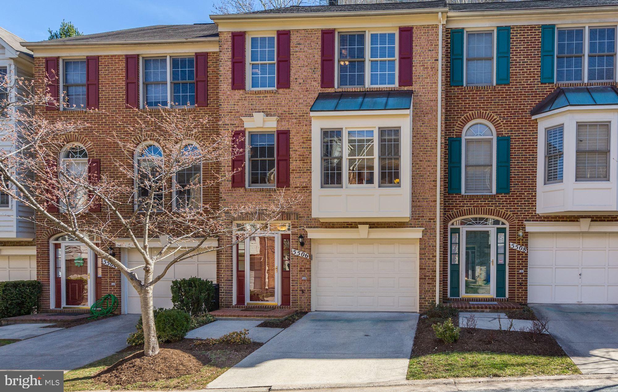 Wow!! Gorgeous, freshly painted three story bright and airy townhome with three bedrooms and three full and one half baths. The main level features hardwood floors throughout the living room (with bay windows) and dining room (with chandelier and pass through window). Gourmet kitchen and breakfast area with stainless steel appliances, granite countertops, new ceramic tile flooring, laundry closet, and french door to a large deck. The upper level encompasses two large MBR Suites, both with expansive closets, and en-suite bathrooms. The lower level features a gracious foyer entry, 3rd bedroom with wood burning fireplace, full bathroom, access to pavered patio, and a one car garage. Don't miss out on this beautiful home! Open House Sunday 4/14, 1-3pm.