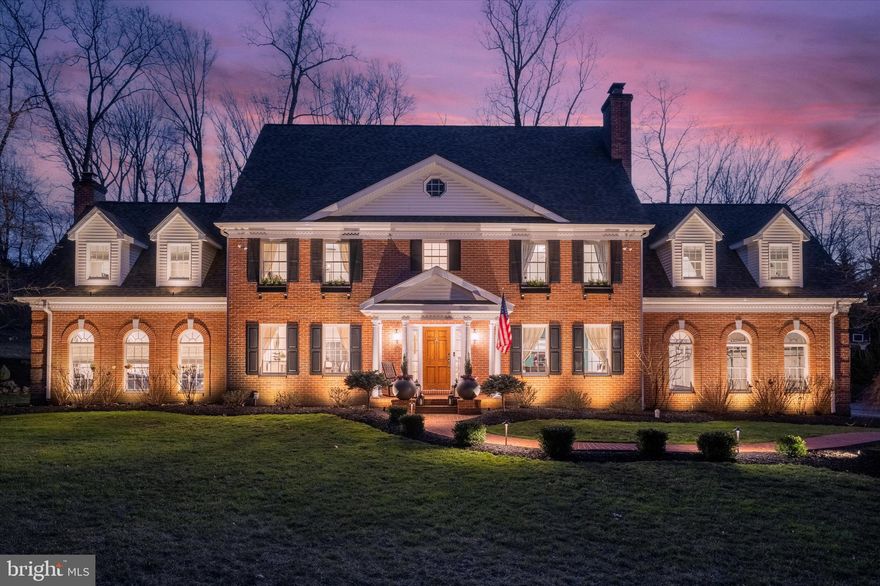 Welcome to 1000 Beverly Ln, an elegant and stylishly updated Georgian brick colonial situated on a quiet cul de sac in Newtown Square. Fall in love with beautifully landscaped 2 acre grounds and brick walkway showcased by the home’s lighting system.  Step inside to the welcoming center hall foyer to find sparkling refinished hardwood floors, decorative molding, gorgeous light fixtures and high-end wall coverings that showcase the attention to detail and custom features this home has to offer. To the right of the foyer is an office/den enclosed by double glass French paneled doors, wood-burning fireplace, and recessed lighting. To the left of the foyer is the grand dining room; a dream for those who host, which has tons of built-in cabinetry, granite countertops, and a wine fridge! The dining room is open to the absolutely beautiful kitchen with seamless quartz countertops, backsplash, and waterfall peninsula island complemented by white cabinetry, farmhouse sink and top of the line stainless steel appliances.   Off the kitchen, sliders lead to the expansive two-tiered brick patio overlooking the massive rear yard with a private wooded backdrop.  Back inside, past the kitchen, two-sets of French Doors lead to an incredible great room.  The focal point is the floor-to-ceiling brick gas fireplace and mantel with lunette windows surrounding allowing an abundance of natural light pouring through. The main level is complete with a powder room, laundry room and mudroom adjacent to the attached two-car garage. Walk up the staircase to the second floor landing. The spacious primary ensuite bedroom is privately located and features a luxurious updated primary bath, with a glass enclosed walk-in shower, stunning freestanding soaking tub, and plank tile flooring.  A rare feature here is a conveniently located laundry shoot! Off the bathroom is a sizable dressing room with double sinks that floats right into a large, custom shelved walk-in closet. Both spaces are drenched in sunlight and equipped with welcomed skylights.  Also, off the primary bedroom is an amazing sitting room/exercise room with a gas fireplace. Down the hall there are two other nicely sized bedrooms both with great closet space that share a large recently renovated hall bath with shower/tub combination stylish tile and neutral fixtures. On the far side of the home there is an additional fourth bedroom with an updated on-suite bathroom and a railroad style second room off of it, which could be used as a fifth bedroom or second office.  Each bedroom offers plush cozy upgraded carpeting, ceiling fans, and recessed lighting. The finished basement adds almost 2,000 additional sq ft to the home plus an unfinished room for all your storage needs and where all the systems to the home are tucked away.  Notable highlights include: (2) Geothermal units, (2) 50-gallon water heaters and water softener/filtration systems, all new units/systems replaced in the last 1-4 years!  This wonderful home is part of the Okehocking Hills neighborhood community that hosts a variety of fun-filled events throughout the year including trick-or-treating for halloween, bonfires, holiday celebrations, potlucks, and more!  This home is located in Rose Tree Media School district and just minutes from the Ellis Preserve Whole Foods shopping center, Ridley Creek State Park, a wide variety of shopping and dining and is easily accessible to all major roadways. Do not miss your opportunity to own this incredible home in a truly desirable Newtown Square location!