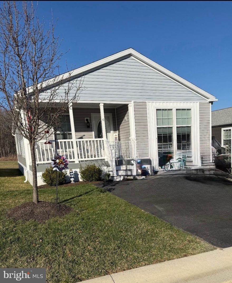 Welcome to this beautiful 3-bedroom, 2-bathroom home located in the charming town of Perryville, MD. This Modular style home is situated in a 55+ Adult Community, offering a serene and peaceful atmosphere for its residents. 
The property features 1-level living with a spacious layout that includes a cozy fireplace in the living room for those chilly evenings. The home is equipped with cooling provided by ceiling fans and central A/C, as well as heating through a Heat Pump system for year-round comfort. 
Inside, you will find built-in bookshelves, new carpeting, and all appliances included for your convenience. The lot rent includes water, sewer, taxes, trash removal, and lawn maintenance, making it easy to enjoy a hassle-free lifestyle. 
One of the highlights of this community is the private beach area, complete with Tiki umbrellas for relaxing in the sun. Residents also have access to a walking and cart path, fishing dock, and boat ramp for outdoor recreation right at their fingertips. 
One of the largest homes in the community with a open layout and plenty of extras.  Don't miss the opportunity to own this great home where you can enjoy your walk by the water and a peaceful day.  
Don't miss out on this opportunity to experience resort-style living in a vibrant 55+ Adult Community in Perryville. Schedule a showing today and make this your new dream home! 
Professional photos coming soon.