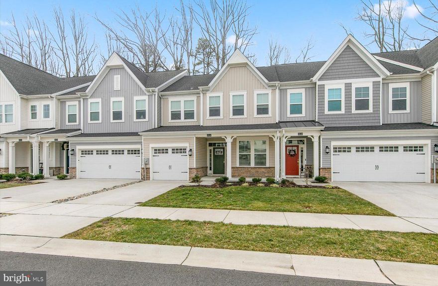 Discover this like-new 4-bedroom, 2.5-bath villa in the amenity-rich Villas at Walden community! Designed for modern living, the open floor plan showcases high-end LVP flooring, soaring ceilings that flood the space with natural light, and a gourmet kitchen equipped with stainless steel appliances, a large prep island, stylish backsplash, and pendant lighting. The first-level owner's suite, complete with an ensuite bath, offers the convenience of one-level living. Step outside to enjoy the serene rear patio, which overlooks a peaceful wooded backdrop. Upstairs, three additional bedrooms and a loft provide plenty of space to grow, relax, or entertain. With community amenities including pools, walking trails, athletic courts, and a central location in the Cape Henlopen School District, this move-in-ready home is a must-see!