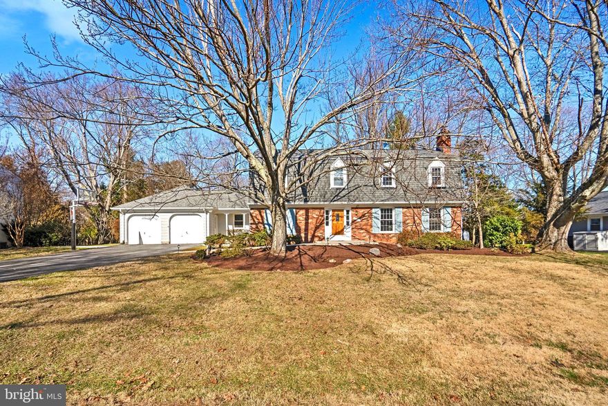 Don't miss this gorgeously appointed five bedroom, three and a half bathroom, EXPANDED and RENOVATED home, in the serene and beautiful Lake Normandy Estates!  You will find the perfect blend of classic style and touches of modern, creating the perfect canvas for all of your needs.  Hosting friends and family will be a breeze in the many spaces perfect for entertaining.  Hardwoods, newly refinished, make up much of the flooring throughout the house.  The Family Room with a wood burning fire place opens into the updated kitchen with elegant natural cherry custom cabinetry.  Gas cooking, with two ovens, two sinks and two dishwashers, gives you every convenience you willneed in a kitchen.  The Dining Room is simply built for entertaining.  You have to see it to believe it!  Along with a three-season covered porch, the main level is rounded out with a Formal Living room, with French doors and another wood burning fireplace, Mudroom and the true definition of a Utility Room.  Updated Lighting is found throughout this move-in-ready home as well!   Upstairs you will find four bedrooms and two full baths.  The Owner's Suite has an enormous walk-in closet with a window, and a stunningly renovated bathroom that can only be described as opulent!  The fully finished basement includes another large bedroom, full bathroom, large recreation room and walk-out to a lovely brick patio, perfect for sitting around a fire pit.  Other upgrades include Geothermal Heat, and the roof was replaced 2 years ago!  Minutes from Cabin John Shopping, I270, I495 and so much more, this one won't be around long!