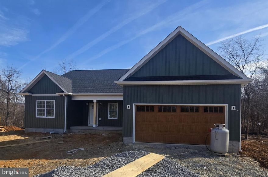 June/July 2026 delivery on this Brand New ranch home!!   This 1,670 square foot Ranch style home boasts the sought after split bedroom design. The kitchen/dining combo is open to the expansive great room and features vaulted ceilings.  Quartz, ceramic, luxury vinyl plank flooring, carpet and stainless steel appliance package. Primary bath has a separate tiled shower and soaking tub! Home is larger than it looks providing maximum usage of interior space. The front porch is great for evenings relaxing in a country setting that is close to amenities.  Full walk up basement.  Buyer pays transfer tax stamps.  Measurements are approximate. "All images used are for illustrative purposes. In some cases, it may not be possible to show photographs of the exact property; therefore, we utilize photography of a similar property. Images are for guidance only and do not necessarily represent a true and accurate depiction of the condition of the property."
"Please note: The photos shown are of a similar completed home. The specific home may vary in floor plan, finishes, or upgrades. The builder reserves the right to substitute materials that may not be available to avoid delays."