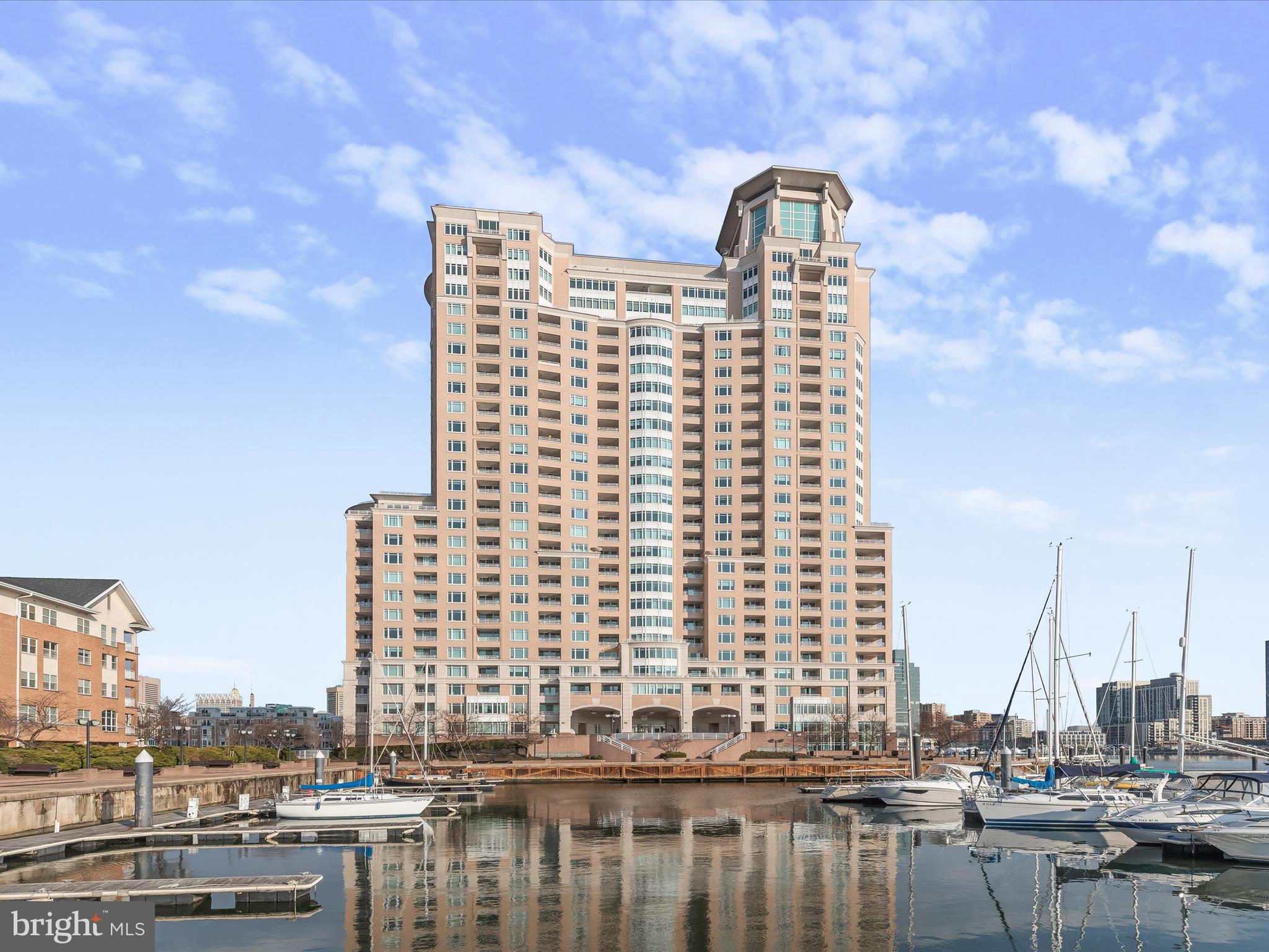 Nestled in the renowned Harborview Towers, this beautifully updated 1-bedroom, 1-bath condo offers the perfect blend of comfort, convenience, and style. The moment you step inside, you'll be captivated by the engineered hard wood floors that flow seamlessly throughout the home, complemented by a fresh coat of paint and a modern lighting package that enhances every corner. The kitchen is designed for style and functionality, featuring stainless steel appliances, granite counters, a pantry for extra storage, and a pass-through view into the dining area, creating an open and inviting atmosphere. The spacious primary bedroom is a true retreat, featuring breathtaking, panoramic views of the Inner Harbor, Harborview Marina, and the iconic Domino’s Sugar sign! Step out onto your private balcony to enjoy the sights and sounds of the water, or revel in front-row views of some of the city’s most celebrated events, think spectacular New Year’s Eve and 4th of July fireworks, the Lighted Boat Parade, and the Fleet Week ships sailing by. Harborview Towers doesn’t just offer a residence; it provides a lifestyle. With both an indoor lap pool and hot tub, a fully equipped fitness center, steam and sauna rooms, and 3 event rooms for private usage or joining neighbors for impromptu conversations, a party room complete, there's no shortage of ways to unwind. The 24/7 concierge service, on-site management office, and valet parking for guests add convenience and luxury to your day-to-day. Plus, you'll enjoy the peace of mind offered by the property’s security staff, providing safety and comfort. Situated right on the Inner Harbor Promenade, this condo places you at the center of the vibrant energy of the city. You’ll be steps away from world-class shopping, gourmet dining, and local events, with convenient access to the MARC train, BWI Airport, I-95, and both sports stadiums. Don’t miss the chance to live in one of Baltimore’s most sought-after locations—schedule a private tour today and experience the best of city living with unparalleled views and luxury amenities.