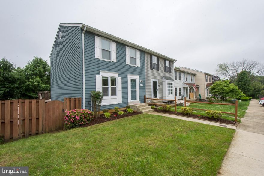 Wonderful end unit in Whispering Woods. Seller offering 3% closing Help. Renovated baths, open main floor with hardwood floors. Large bedrooms. Oversized terraced, incredibly large back yard. Deck off rear, great for outdoor entertaining. Convenient to community tot lot and walking trail. Near Annapolis, convenient to Baltimore and Washington DC.