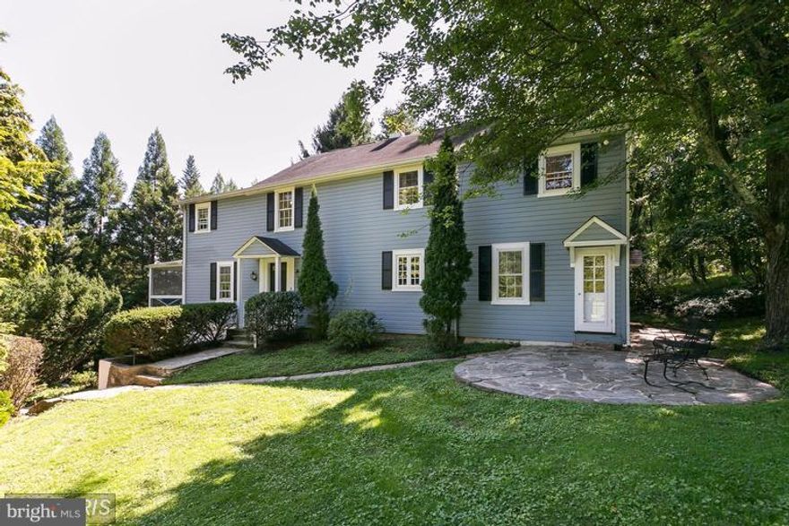 Charming 4BR Ruxton home in lovely, bucolic setting!  Spacious, sunny rooms!  Updated kitchen with table space and washer/dryer.  Den/family room off kitchen.  Large living room with wood burning fireplace and sliders to screened porch.  Main level powder rm.  Master bedroom with adjoining sitting room and bathroom.  Private setting but close to Towson, 83 and 695!