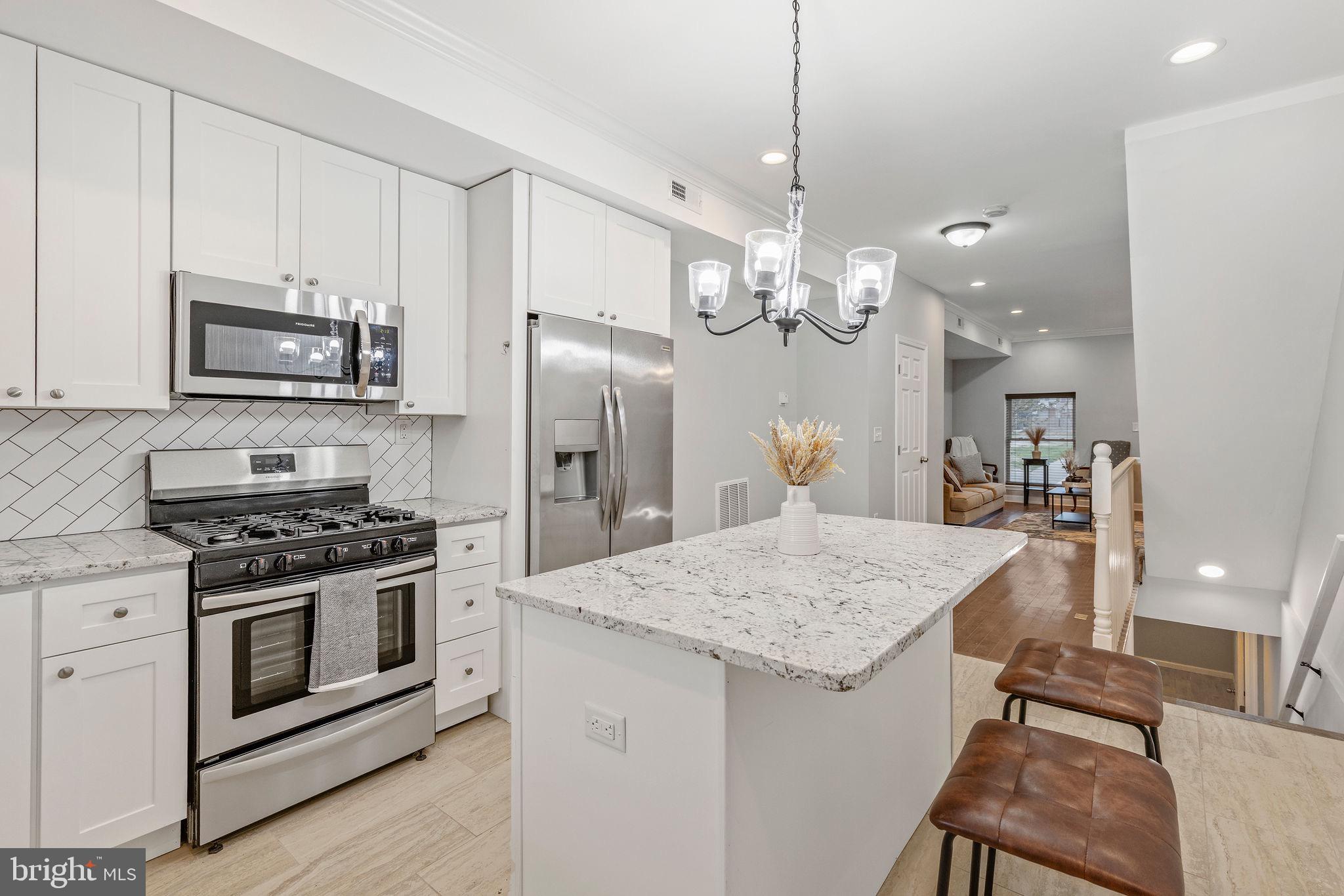 Welcome to 711 N Montford Avenue, Baltimore, MD 21205
Step into a home that instantly feels like the one. Nestled in the vibrant heart of East Baltimore, this fully renovated 3-bedroom, 3.5-bath gem invites you into a lifestyle that blends modern comfort with timeless city charm. Just blocks from Johns Hopkins Hospital and Patterson Park, this home offers a perfect balance of energy, convenience, and sanctuary.
From the moment you walk through the front door, you’re welcomed by the warmth of natural light cascading across gleaming hardwood floors. The open-concept main level is designed for both daily living and effortless entertaining. Whether you're hosting friends for dinner or enjoying a quiet evening on the couch, the seamless flow between the living, dining, and kitchen spaces offers flexibility and comfort.
The kitchen is truly the heart of this home — a chef’s dream with granite countertops, stainless steel appliances, ample cabinet space, and sleek modern finishes. You can almost hear the sizzle of a Sunday morning breakfast or the laughter from a Friday night gathering.
Each of the three bedrooms offers generous space, privacy, and peaceful retreat. With three full bathrooms and a convenient half-bath, morning routines and evening wind-downs are easier and more luxurious. The bathrooms are dressed in clean lines, rich tiling, and elegant fixtures — designed to help you start and end each day feeling refreshed.
One of the home’s most unexpected joys is the thoughtful layout that supports both connection and calm. Whether you're a homeowner, traveling nurse, med student, or investor, this space offers the versatility to adapt to your life. A private outdoor area adds even more value — ideal for your morning coffee, evening wine, or weekend cookouts.
Located just minutes from Johns Hopkins Hospital, this home places you in the heart of everything East Baltimore has to offer. Enjoy morning strolls or afternoon workouts at nearby Patterson Park, a beloved green space featuring trails, sports courts, a dog park, and scenic views. For your daily coffee fix, Starbucks and Ceremony Coffee are just around the corner, while grocery runs are a breeze with Whole Foods, MOM’s Organic Market, and local farmers markets all within easy reach. When it’s time to dine out, you’ll be surrounded by some of Baltimore’s most acclaimed restaurants, including Snake Hill Tavern, La Barrita, Alma Cocina Latina, and Cocina Luchadoras. With fast access to I-83, I-95, and Route 40, commuting to anywhere in the city or region is convenient and stress-free.
Down Payment Assistance Available:
Eligible buyers may take advantage of Baltimore City homeownership incentive programs, such as the First-Time Homebuyers Incentive, Buying Into Baltimore, offering potential financial assistance and little money down options.
This is more than just a house — it’s a chance to live with purpose, and become part of a community full of culture, heart, and opportunity. Fall in love with your future at 711 N Montford Avenue.