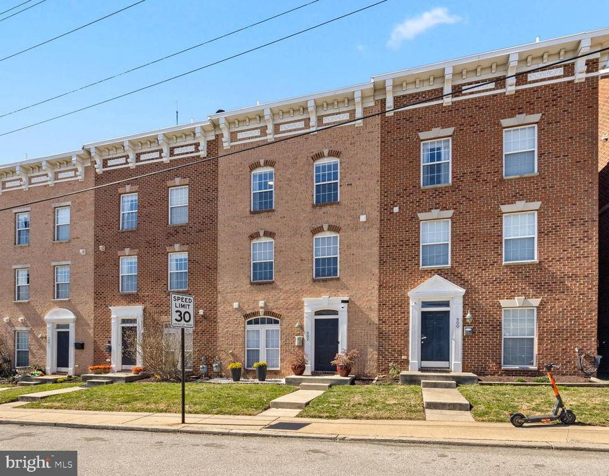 Welcome to 902 Oldham Street. This beautifully refinished townhome offers 4 levels with 3 bedrooms and 2.5 bathrooms. Thoughtfully designed with modern updates, this home perfectly balances style, comfort, and convenience. As you enter the main level, you'll discover a versatile open space, ideal for an office, guest space or workout room. This level also includes a laundry area and access to the 2-car garage, adding both practicality and ease. The second level is a true standout, showcasing high-end finishes throughout. LPV waterproof and scratch-resistant flooring leads you into the brand-new kitchen, complete with soft-close cabinetry, a tile backsplash, quartz countertops, and LG stainless steel appliances. The appliance package includes a double oven and microwave with built in hood that is wifi enabled. The nearly 10-foot island with wood paneling is perfect for entertaining, while high cabinetry offers practical space for countertop appliances. The dining room features a stunning accent wall and cordless light fixtures, and the spacious living room offers ample space for relaxation. On the third level, you’ll find the LPV flooring continued with three generously sized bedrooms, including a large primary suite with a walk-in closet and an updated full bathroom. A set of stairs leads to the fourth level, where you’ll find a wet bar and mini fridge with access to the rooftop deck offering the perfect space for entertaining and providing sweeping views of the city. Recent upgrades include flooring, kitchen, appliances, blinds, half bathroom remodel, smoke/co detectors, garage door opener and springs, door knobs, hinges, hardware, outlet covers, switches, light fixtures, paint, and more (2023). Conveniently located just moments from shopping, dining, and major commuter routes—including the new Volo Sports Courts, Canton Crossing, and Yard 56—this home seamlessly blends urban convenience with comfort. Welcome home!