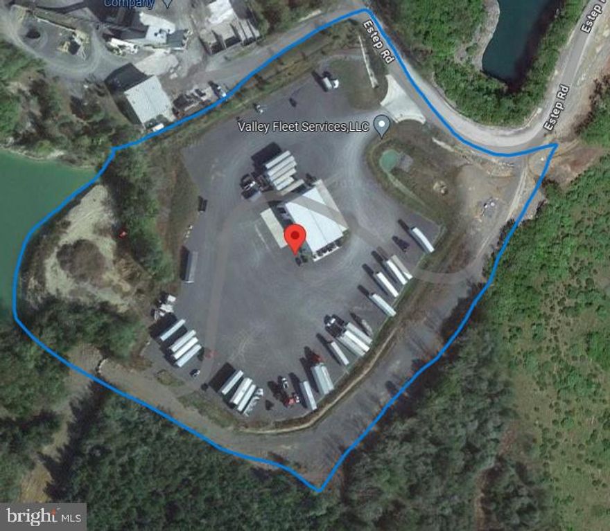 This incredible property is over 7 Acres Zoned Industrial, and is positioned less than a mile from Interstate 81!  Truck and Trailer parking space is abundant.  The building is 6,000 SF with a bonus enclosed mezzanine over the office space with full interior staircase.  The building has 3 drive-thru bays.  The office space and entry space are nicely divided and 3 bathrooms, one with a full shower, are included.  The training room/breakroom and kitchen area are large and useful.  The bays have high ceilings and waste oil heaters.  All showings are by appointment with listing agent only.