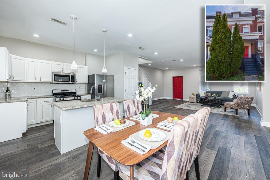 INCREDIBLE VALUE FOR THIS NEWLY RENOVATED PORCH FRONT ROWHOME WITH OVER 2,000 SQ. FT. OF LIVING SPACE!  Open floor plan with wood flooring throughout, spacious living room with a separate dining area, gourmet island kitchen with ss appliances & granite counters, main level laundry room, upper level Primary bedroom suite with a full bath and 3 additional bedrooms with a hall bath, a fully finished basement with a family room and a half bath, and a spacious fenced yard!