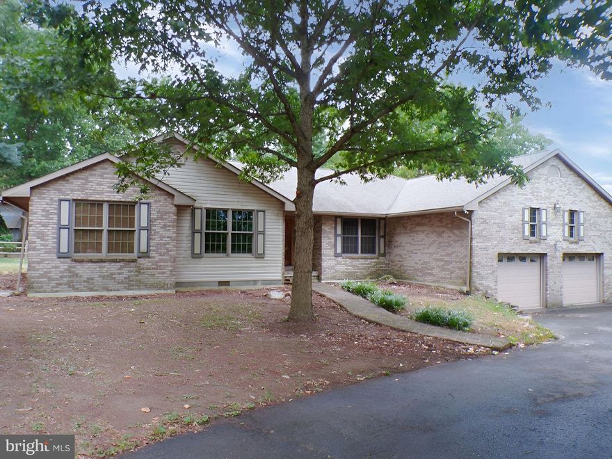 Luxury at a price you can afford.  This home offers large areas to entertain,  relax and enjoy life.  The yard is  .8Ac +  with a studio shed and garden shed just waiting for your landscaping touches.   Located at the end of the street it offers seclusion and privacy.  The front foyer offers a grand entrance to a great home with a  large kitchen, living room,den, additional enclosed back sunroom., formal dining room and 3 large bedrooms and 2 baths all on 1 level.   Oversized garage  has additional elevated storage just off of the laundry room for all of the seasonal items.   You won't want to miss this one.  Call for appt. today!!