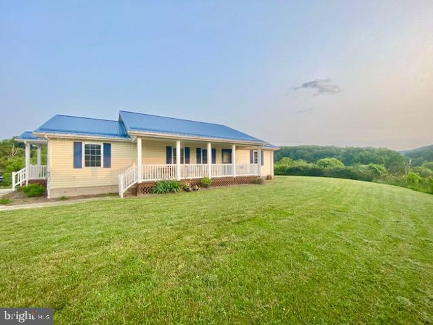 Make yourself at home among the rolling hills of West Virginia in this beautiful one-story ranch-style home. Complete with three bedrooms, and two full bathrooms, this charming home offers breathtaking panoramic views and sits on more than 6 acres of land, making it the perfect place to settle in and enjoy an evening the views.   
Also included is a partially finished basement with a separate rear entrance for convenience, as well as multiple outbuildings for use and additional storage. 
This home also includes outdoor play equipment perfect for entertaining young children. 
Multiple landscape benefits include more than 6 acres of property, private walking trials and a small stocked pond on the property, making it an ideal place for family fun adventures or even mini-homesteading opportunities. 

Contact us today to schedule a tour of your new home!