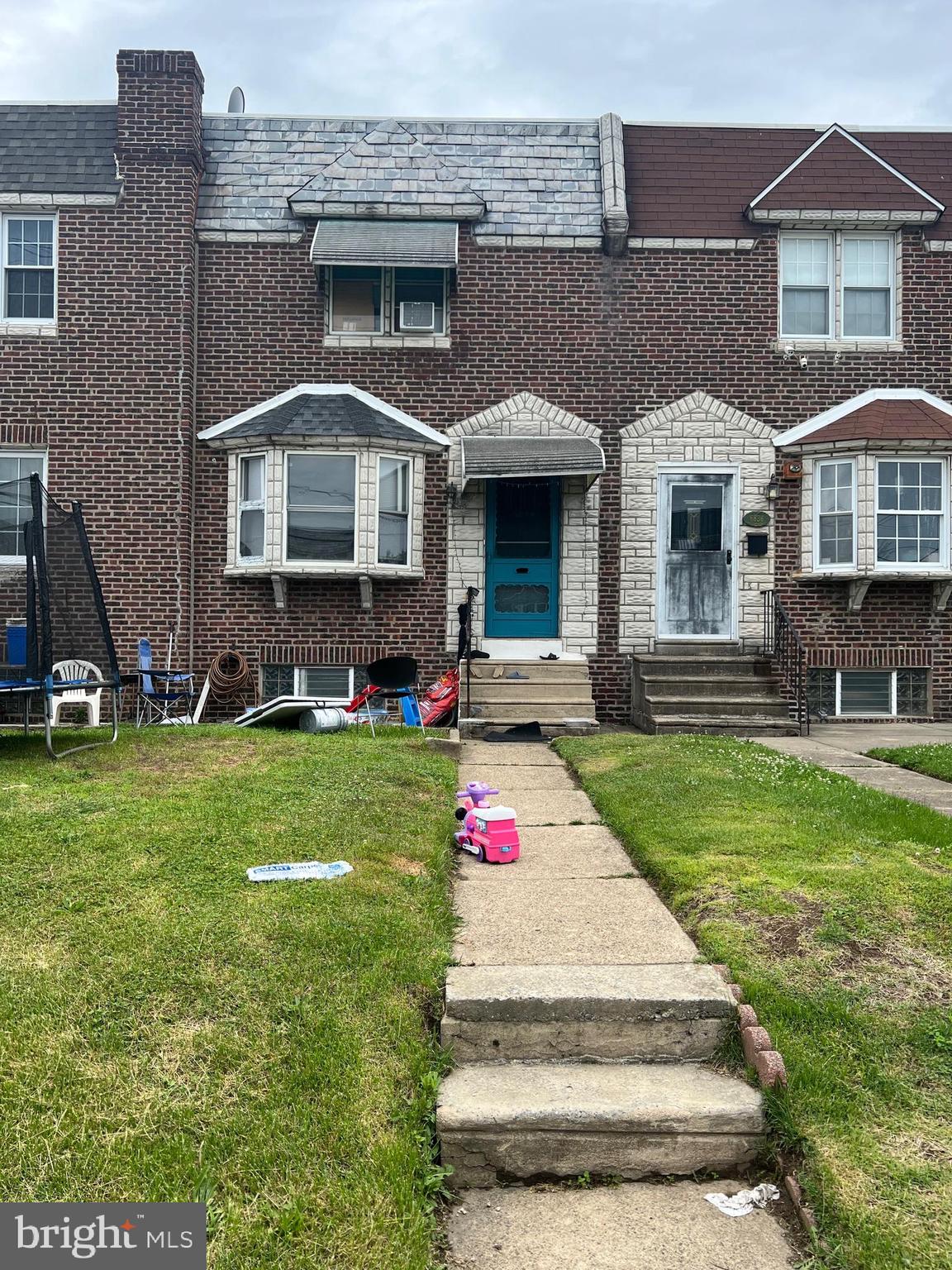 Regular town/row house in a relatively busy, convenient location near school, mall... Priced to sell.