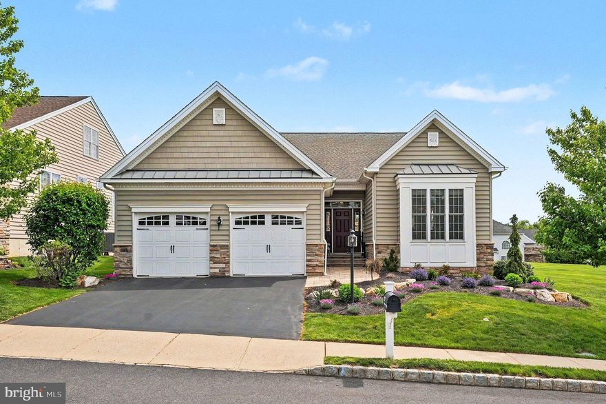 SHOWINGS START SATURDAY, 5/15 @ NOON.  Tucked beside community open space in the sought after 55+ community of Meadow Glen, this beautifully maintained home with recently upgraded hardscaping in the front, offers a bright, airy feel from the moment you step inside. Large windows invite an abundance of natural light throughout the home, while the thoughtful layout blends comfort, functionality, and easy everyday living.

Hardwood flooring flows through much of the main level, complemented by spacious living areas designed for both relaxing and entertaining. Just off the living room, a private office with glass French doors creates the perfect space for reading, working from home, hobbies, or welcoming overnight guests when needed.

The kitchen serves as the heart of the home with a center island, peninsula, and an open flow into the main living space and dining area, creating an inviting setting for gatherings both large and small. Off the living room, the oversized composite deck offers a peaceful outdoor retreat with a partially covered section ideal for morning coffee, outdoor dining, or simply enjoying the tranquil surroundings and adjacent open space.

The primary suite serves as a comfortable retreat featuring a spacious walk-in closet and a custom bathroom layout complete with stall shower and double vanity . A second bedroom, full hall bath and laundry round out the main level.

Downstairs, the expansive unfinished basement offers exceptional potential for future living space, complete with an egress window and a small partitioned area previously used as a workshop. Whether you envision additional entertaining space, a home gym, hobby area, or guest overflow space, the basement provides outstanding flexibility for future needs.  2-car attached garage plus driveway parking.

Beyond the home itself, Meadow Glen is known for its welcoming atmosphere, scenic walking paths, and vibrant social opportunities. Residents enjoy a beautifully appointed clubhouse, pool and spa, fitness amenities, dog park, bocce, and gathering spaces that allow you to plug into the community as much or as little as you desire.   Lawn & garden care along with snow removal to your front door enhance the convenience.  Surrounded in part by preserved land, a short drive to quaint Skippack Village and the Collegeville Town Center, Meadow Glen offers a rare combination of convenience, beauty, and low maintenance living in an exceptional setting.