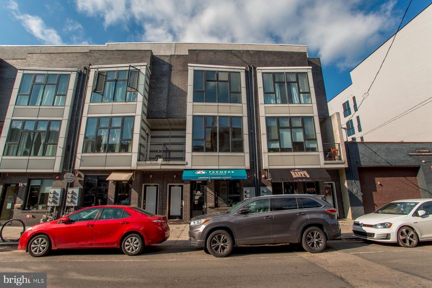 Incredible multi-unit in the heart of Fishtown! This 3 story building, zoned CMX2, has so much to offer!! The 1st floor of the building is currently set up as a professional office with full bathroom, finished basement and fenced in backyard. 
The residential unit upstairs features 3 Bedroom, 3 Bath with 2 balconies and a deck accessible only from the master suite. Enter into the amazing, open living space with 10ft ceilings, large windows to maximize light and beautiful hardwood floors. Gourmet kitchen featuring espresso maple cabinets and White, Quartz countertops, island with  stainless steel appliances. Just off the kitchen, you can exit the sliding doors to enjoy a 5x10 low maintenance composite deck. Spacious living room also has a balcony for outdoor relaxing. Next level has 2 bedrooms, full bath and laundry closet with front loading washer and dryer. Each bedroom has ample closet space. Final Level is home to the primary suite which can be entered through french doors from the top of the open staircase. Spa like bathroom with large soaking tub and shower stall with multi shower heads, Walk in closet, Linen closet and 14x7 deck off bedroom. 3-Zoned high efficiency HVAC systems for comfort heating and cooling.