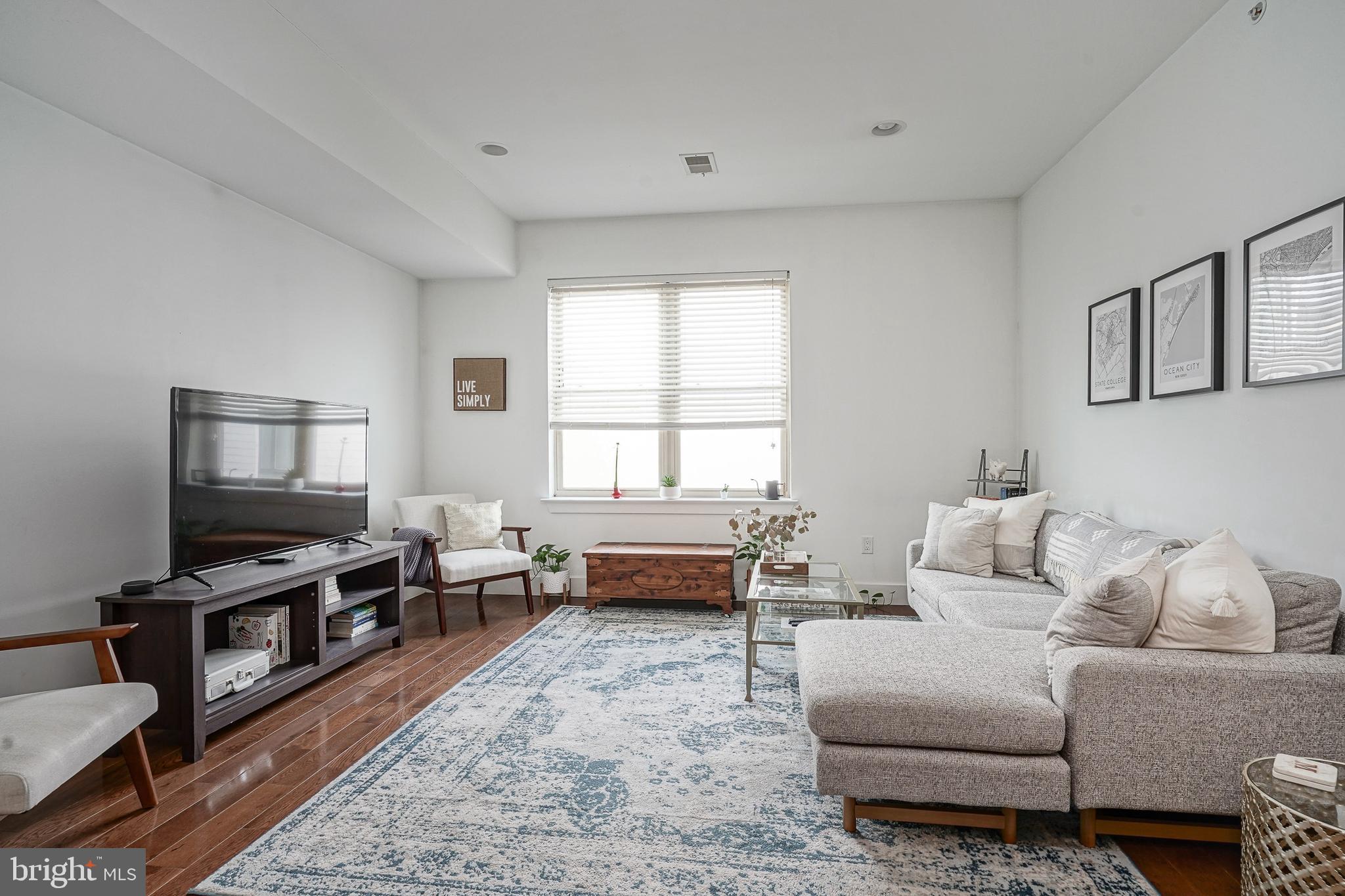 Welcome to this beautifully constructed 1BD/1BA condo in the heart of Francisville with incredibly low condo fees and THREE YEARS LEFT ON THE TAX ABATEMENT. Designed with quality in mind, this stunning home features solid hardwood floors, granite countertops, stainless steel appliances and thoughtful details throughout. The open layout brings in natural light and offers stunning skyline views from the bedroom, which includes a large walk-in closet and ample space for a king-size bed and more. The oversized bathroom features a walk-in shower with floor-to-ceiling tile, and there is a front loading washer and dryer in the hall for added convenience. Enjoy the shared panoramic roof deck with gorgeous views of Center City, and a small shared storage space on the lower level, ideal for bikes and extra items. Located on an extra wide street with ample parking, this condo is surrounded by new construction and just a short walk to Fairmount Ave cafes, restaurants and shopping. Commuting is a breeze via the Broad Street Line and you'll have easy access to highways and transportation. Don't wait, call today and take advantage of this incredible opportunity to make 1819 Wylie St your new home!