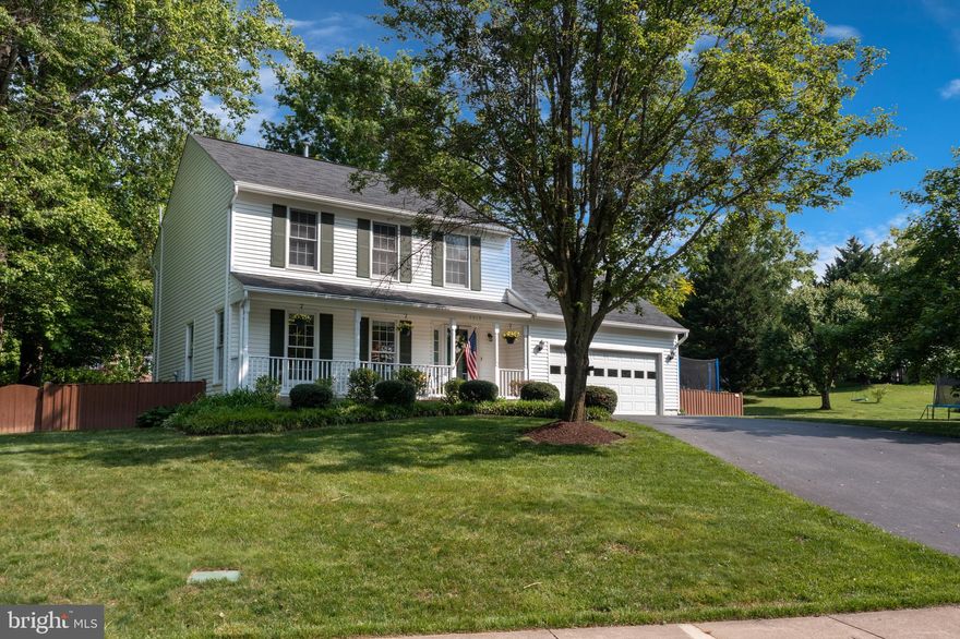 LOOKING FOR A MOVE-IN READY DARLING UPGRADED FAIRFAX STATION HOME?  Look no further, you found it here!  This amazing home is teaming with impressive updates! First & foremost enjoy a double cul-de-sac location with no thru traffic,  over a third of an acre  & fully fenced level lot.  Pause a moment as you step  up to the front porch & envision enjoying your morning coffee here & greeting your neighbors!  Come inside & be wowed by the  lovely chocolate brown hardwood floors throughout the majority of the home. Enjoy a fully updated new white kitchen with tall cabinetry, an island , pantry & stainless steel appliances!  Abutting this is the sunny breakfast nook with easy sightlines to the extra large family room! in this area you find a gas fireplace & 2 sliding glass doors out to your TREX deck & large backyard.  Tasteful light fixtures & stunning paint enhances the entire house! The large living room in the front of the house also boasts the tasteful window coverings & dark chocolate hardwoods as well as the dining room where all those special entertaining moments can happen.  Upstairs are 4 bedrooms. There is a nice primary bedrooms, large spa like primary bathroom with updated tall dual vanity, special large shower & large soaking tub on a lovely slate floor. In the master bedroom is where you also find a special built-in wall safe.  The hall bathroom also boasts updates with the tile & the new vanity. 3 additional bedrooms complete this level. The one is especially large & could also be easily used as a convenient office.  Moving downstairs you  find a fully finished lower level with a convenient sizable recreation room along with another 1/2 bath, intimate office space (or bonus room) & a large super convenient laundry with rows of cabinetry & plenty of extra storage space too.  Enjoy the convenience of updated systems =  2015 ROOF / 2019 Hot Water Heater /  2017 HVAC etc!  This great location is minutes to the #123 & Fairfax County Parkway with easy commute options to DC, Pentagon, Ft Belvoir by HOV lanes, metro, bus or commuter lots! This home is also proud to be part of Silverbrook Elementary & South County Middle & Highschool too.  Move in & enjoy 2 nearby Community pools which you can pay Associate Membership to.  The location of this home is prime in the South Run Oaks neighborhood with a short stroll to the large soccer field, 2 basketball courts & a nice tot-lot. But the best part is the easy access to the myriad of trails bringing one within an easy walk to Lake Mercer or Burke Lake with its amazing amenities!