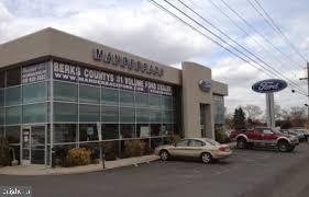 Former Manderbach Ford location on 7+ Acres! Property includes 1) 27,345 SF Main Building consisting of a) Showroom (5,318 SF), b) Mechanics Shop (16,784 SF) w/ 18' ceilings & 8 drive in doors and c) Second Floor office/storage (5,243 SF); 2) Detail Building w/ 6 overhead doors (3,922 SF); and 3) Body Shop (7,665 SF) w/ 5bays & drivethru overhead doors. C-3 Commercial Zoning with 586' frontage along 5th St. Hwy. Acreage/ Buildings can be Divided. 100+ Car Parking. Lease Possible.