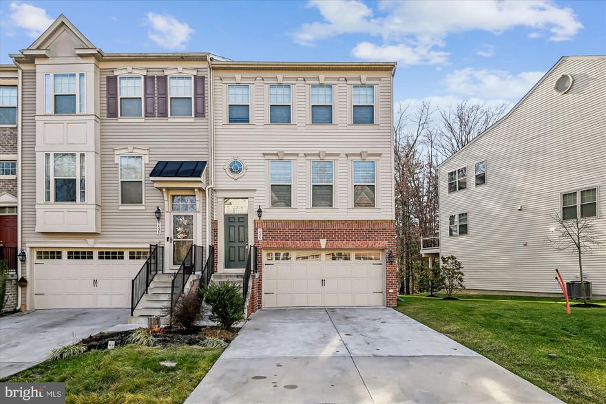 Shows like a model home!!! MUST SEE!!! Over 2500 sq ft, End Unit 3 Level,4 bed, 3.5 baths, gourmet kitchen, sunroom, HUGE master with sitting area. Wrap-around deck, wooded back yard, hardwood. Too many upgrades to list them all!!! Close to shopping and major highways.