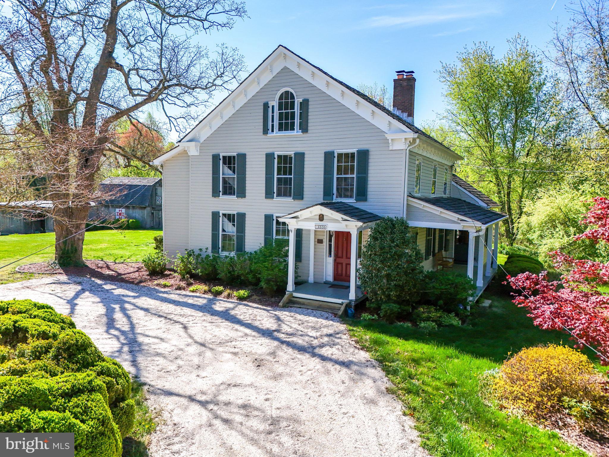 Welcome to a piece of history nestled on 5 acres of land, where the St. Marys Rectory, originally built in 1849, has been transformed into a private residence. This Greek-revival style home, listed on the National Register of Historic Places since 1987, has been meticulously maintained and thoughtfully updated over the years.
Step inside to discover a captivating blend of original charm and modern convenience. The home boasts 5 bedrooms, 2 full bathrooms, and a gourmet kitchen with granite counters, a gas range, and stainless appliances. The spacious entry hall leads to the formal living room and dining room, each adorned with their own fireplaces. On the main level, you'll find a versatile bedroom/office, a full bathroom, a laundry room, and two fireplaces.
The upper levels offer three spacious bedrooms, a bonus room converted into a walk-in closet and dressing room, and a very private 5th bedroom or versatile studio space. Over 30 windows flood the home with natural light, showcasing the impressive closet space and the timeless character of the property.
Outside, the grounds feature a 6-stall run-in barn, a 2-level workshop/barn, a storage shed, and a 30,000 square foot (approx.) area for a garden or agricultural use. With modern updates seamlessly integrated, including central heating and air conditioning, a tankless water heater, and updated bathrooms, the home retains its original mid-19th century charm.
Located less than a 50-minute drive from Washington, D.C., Alexandria, VA, and Annapolis, MD, this property offers the perfect blend of historic allure and modern convenience, making it an ideal everyday home or getaway.