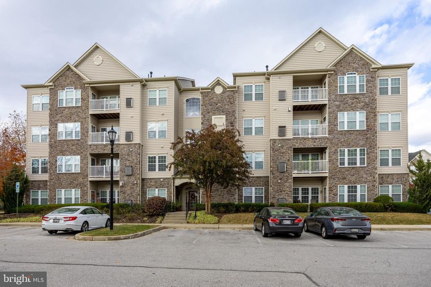 Located in the desirable 55+ community of Courtyards at Waverly Woods East, welcome home to the stylish and comfortable, secure-entry, elevator building, terrace condominium. This bright and sunny open concept unit offers 2 bedrooms, 2 full baths, and over 1,610 finished sqft & it is one of the largest in the building. With minimal maintenance and great amenities, partnered with a wonderful convenient Howard County location, this one has everything for the 55+ lifestyle and more. Located on the 3rd floor, energy bills are very reasonable too. 
Original owners have lovingly cared for this property and pride in ownership is evident throughout. Upon entering you'll notice the polished wood floor foyer leading to the spacious living room. There is a separate dining room with crown molding and trim. The kitchen boasts 42" cabinets, granite countertops and appliances with separate cozy breakfast nook. From the breakfast nook gain access to a private balcony that is perfect for your morning coffee. This corner unit offers plenty of windows and light throughout. The oversized primary suite has private sitting area with columns and windows on 2 sides. A generous primary suite bathroom has a huge shower with bench, dual vanities and separate linen closet. Multiple walk in and oversized closets throughout the home offer plenty of storage potential. Most systems & appliances have been replaced within the past 5 years.  Immerse yourself in a resort-like lifestyle with exclusive access to a clubhouse, fitness center, meeting room, pool, tennis courts, bocce court, pickleball court, playgrounds, walking trail, gazebos, and even EV chargers for your convenience just steps away from the front door. 
Enjoy the proximity to the Waverly Woods Golf Club, making this residence a haven for both relaxation and recreation. Close to first class restaurants, shopping and even the Turf Valley Resort. It’s one perfect package.