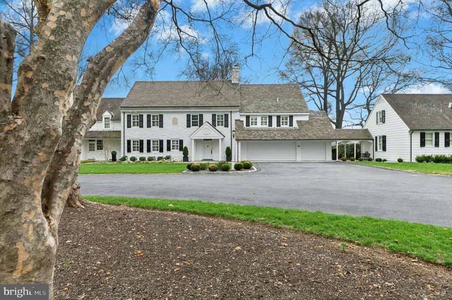 On a private road in a world-class neighborhood, surrounded by mature trees and manicured lawn, this exceptional home has panoramic views over 22 acres of meticulously tended grounds, within walking distance to the Weyhill Golf Course of the Saucon Valley Country Club. This noteworthy property, in coveted “Old Weyhill”, is part of an exclusive eight home enclave that is reminiscent of a New England village green.
Weyhill Circle boasts every amenity one would expect, with a newly remodeled and gracious design. Beautifully redone, with sophisticated additions, there are walls of windows in every room to frame the pastoral and protected vistas. Breathtaking at entrance, an expansive coffered-ceilinged living room is sun-filled with a wonderful flow for entertaining, opening to a stunning covered porch and outdoor kitchen, beautifully landscaped with sunset views. Adjacent, the enormous family room, also with coffered ceiling, boasts a bar, second fireplace, built-in bookcases and a south-facing wall with charming window seats.  An extraordinary and expansive kitchen offers high-end appliances, newly opened to an inviting dining room. Throughout, attention to detail is evident in the custom built-ins and bookcases, crown moldings and fabulous windows, with multiple doors beckoning one outside. Hardwood floors enhance every room, on every floor, while an elevator accesses three levels.
The sumptuous, new primary suite will delight and impress.  A generous primary office opens to a cathedral-ceilinged master bedroom with fireplace, walls of windows and full house deck with incredible long-distance vistas. The elegant primary bath, with dressing room and custom walk-in closet, will soothe and pamper.  Three additional bedrooms, laundry and 2 baths complete the second floor.  A wonderful bonus, the third floor offers an additional family room.
On the lower level, a custom designed wine cellar is adjacent to the elevator, for easy access. There is a work area with a quarter bath and 2025 custom cabinetry. A 20 KW generator and HIK Connect technology offer peace of mind. The new, oversized three car garage has a special alcove for your Golf Cart …. available with SVCC approval.
Weyhill Circle invites one to linger and enjoy the beauty of this environment, in a privileged position amidst a 22 acre piece of paradise …. all within the private roads of the Saucon Valley Country Club.  Rarely does a home offer such sophisticated ease of living, in a premiere location, surrounded by an outside environment that invites you, daily, to walk the acreage and private roads.  On the bluestone patio, overlooking bucolic views, the everyday backdrop includes wildlife by day and a brilliant umbrella of stars by night.  Here, worry-free luxurious living exists in a location that rarely becomes available, in a setting that is one of Saucon Valley’s best.