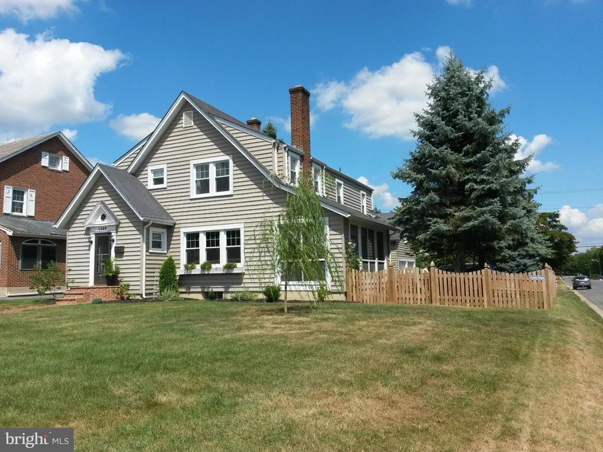 This 4/2.5 home is beautiful and elegant, a real showpiece. The inside flows beautifully and has abundant natural light. You will appreciate the hardwood floors throughout this home as well as the wood burning fireplace and screen porch. All on a corner lot with fenced yard and patio. Off street parking in the ample drive plus 2-car garage on sought after West King Street. See it to believe it!