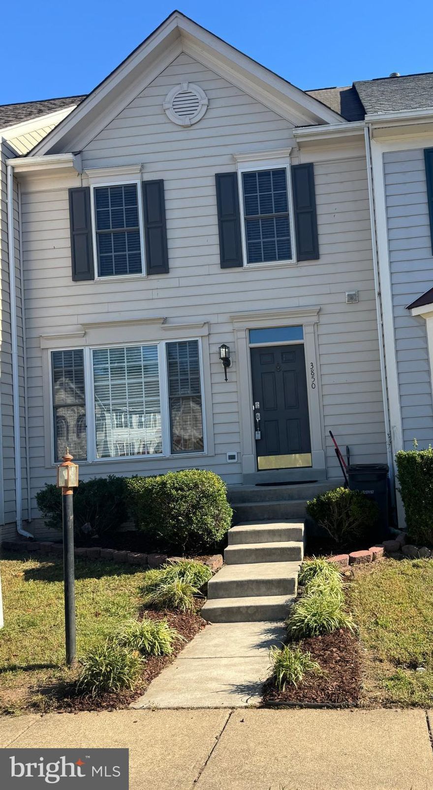 Gorgeous! Sunny & Bright! 3 bedrooms plus a Den,  2 full and 2 half baths. Enjoy the magnificent water views from the primary suite or the sunroom! This lovely home has so much to offer: New Luxury Vinyl flooring in all the bedrooms, newer carpet on the stairwells and lower level,  newer appliances, bump-outs on three levels, a separate laundry room, a washer and dryer, a walk-out basement with a deck, fenced rear, and 2 assigned spaces in front of the property. The open floor plan has an updated kitchen with stainless steel appliances, a built-in microwave, granite counters with glass block backsplash, lots of cabinets, plus a lovely sunroom with a water view.   The primary suite has a sitting room with a view overlooking the water, vaulted ceilings, a walk-in closet, and an ensuite with a soaking tub and separate shower.  The walk-out basement has a large recreation room with a bump-out area, a separate den, a separate laundry room, and a half bath.   Alarm system with motion detectors.  The alarm pricing is not included in the rent. Optional. Enjoy all the amenities in Lake Ridge: 5 community pools, playgrounds, tennis courts, basketball courts, walking trails, parks, and the marina. Bring your kayak or rent one; paddle boats are available to rent, too, or go fishing! Walk to the splash park. Convenient to shopping, restaurants, libraries, and more.  Put this one on your list!