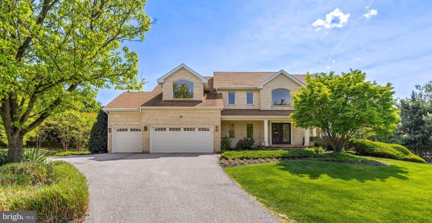 Nestled in the desirable Worthington Park community, this handsome brick front home situated at the top of a quiet cul-de-sac offers casual elegance and timeless design. the bright and airy residence which is one of the largest models in Worthington Park features clean architectural lines, gorgeous refinished oak floors, soaring cathedral and vaulted ceilings and abundant natural light throughout. The main level floor plan flows seamlessly from room to room and includes a sun-filled study, formal dining room, eat-in kitchen and a spacious family room with a distinctive 2-story focal point wall with wood burning fireplace and custom built-ins. Upstairs, the primary suite boasts an architecturally impressive vaulted ceiling, sitting room and elegant handcrafted wardrobe/entertainment unit with a resort-inspired bathroom featuring a clawfoot soaking tub, two separate vanities and oversized stall shower-your personal oasis for relaxation. The upper level is completed with three additional, generously proportioned bedrooms, two full stylishly renovated baths, a loft-style study and secondary staircase for convenient access anywhere on the main level. The fully finished walkout basement, featuring the 5th bedroom, full bath and a bonus room, offers endless possibilities whether it be a game room, billiard area or full au-père/in-law quarters.  Outdoor living and entertaining are enriched on the expansive composite deck, and al fresco dining is simplified on the screened porch while overlooking the manicured lot and flowering crepe myrtles. The seven-year young architectural shingle roof provides years peace of mind and the attached three-car garage and ample driveway parking ensure convenience for you and your guests. Experience the best of Worthington Park living, where every detail has been thoughtfully curated for your enjoyment.